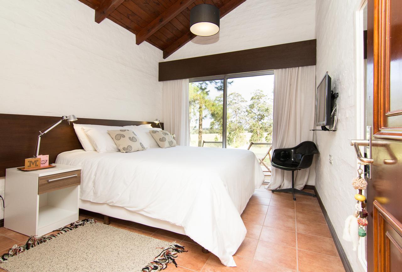 Posada Mosaico Villas Garzon Quarto foto